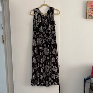 Beautiful classic dress black cream with a little bit of gray gathered at waist.
